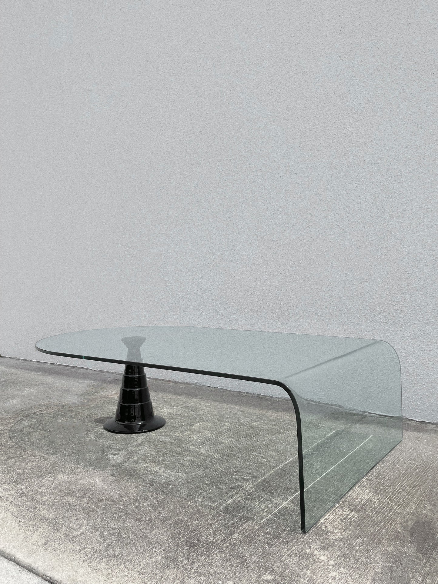 1980s Italian Waterfall Glass Coffee Table w/ Glossy Black Ceramic Pedestal